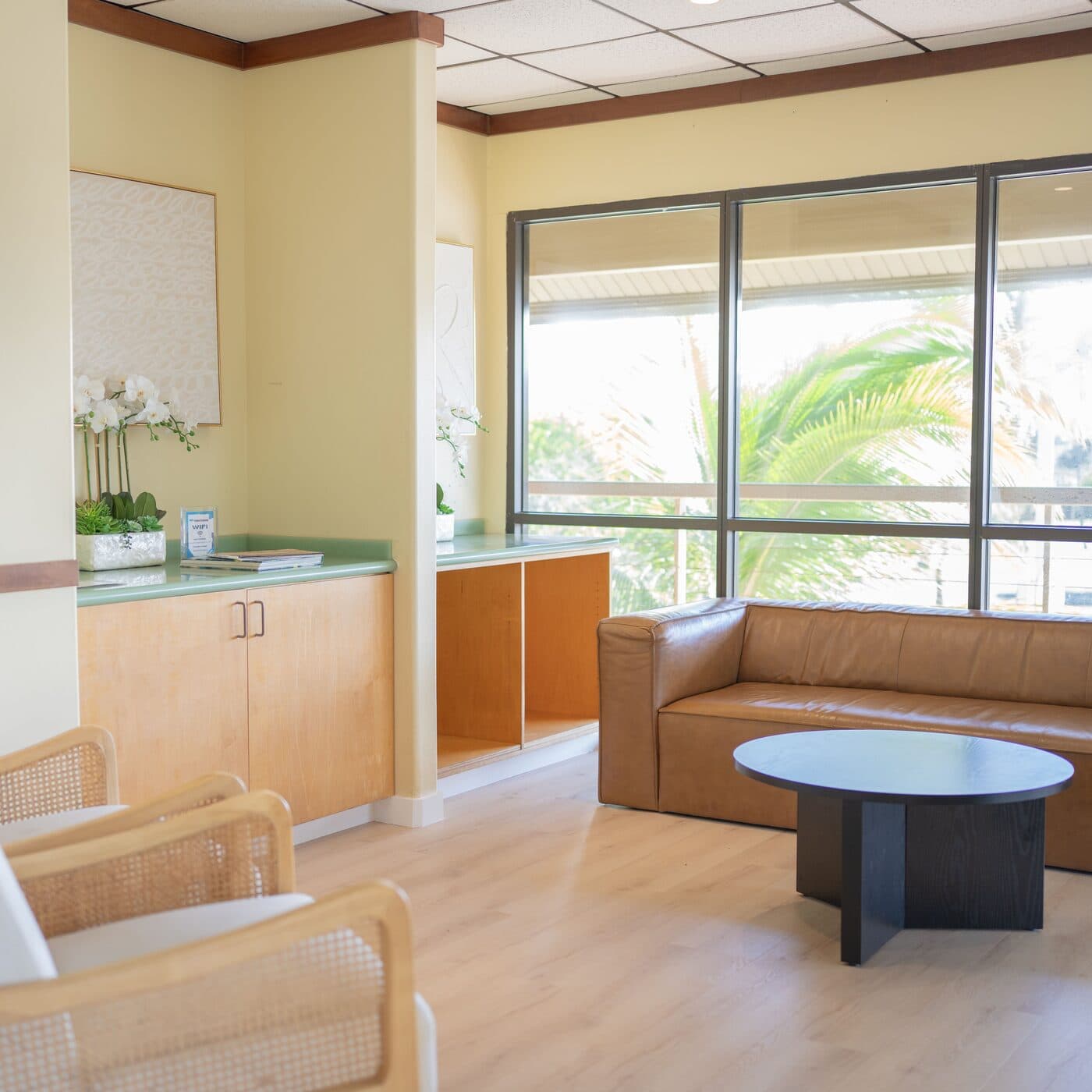 Waiting room seating and windows at the Maui Braces Kahului office